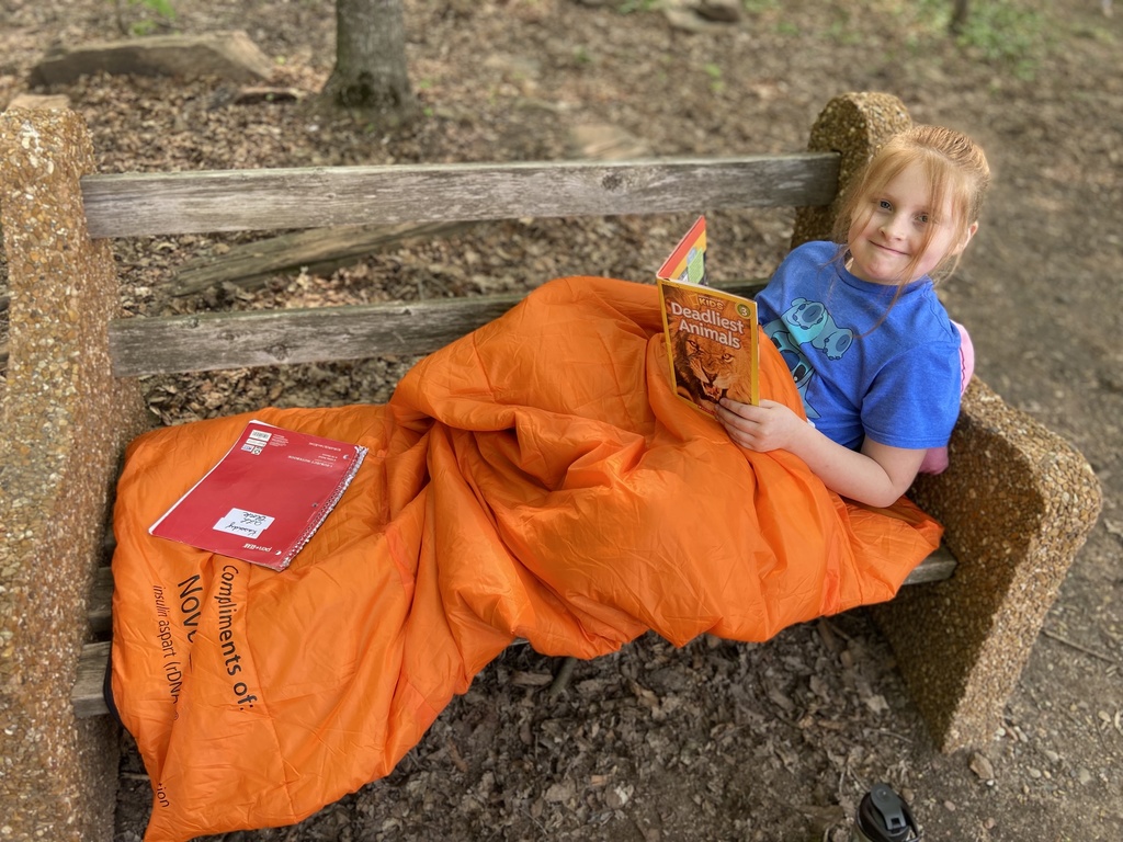 Independent reading and vocabulary logs outside in nature.